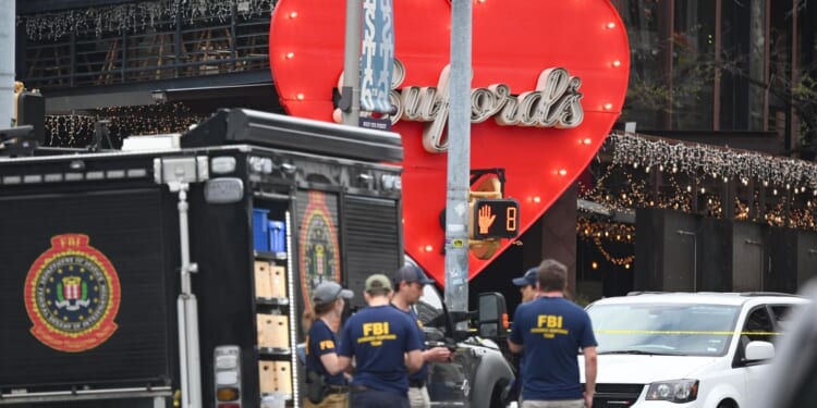 AP source says suspect in Texas shooting wore 'Property of Allah' clothing with Iranian flag