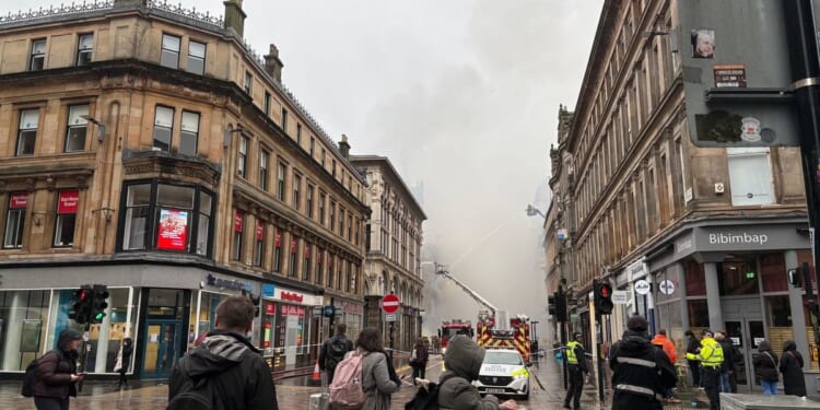 Glasgow building fire closes Scotland’s busiest train station and disrupts rail services