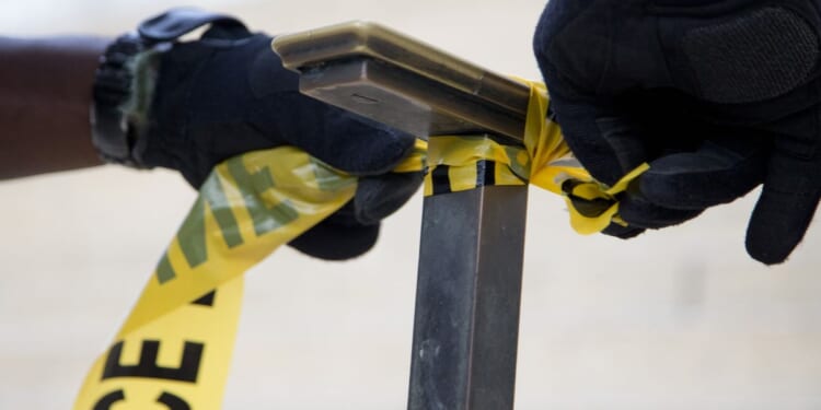 Officer wounded, suspect killed in shooting near synagogue in Baltimore