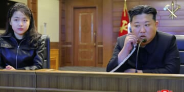 North Korean leader Kim and his daughter try out new pistols at shooting range