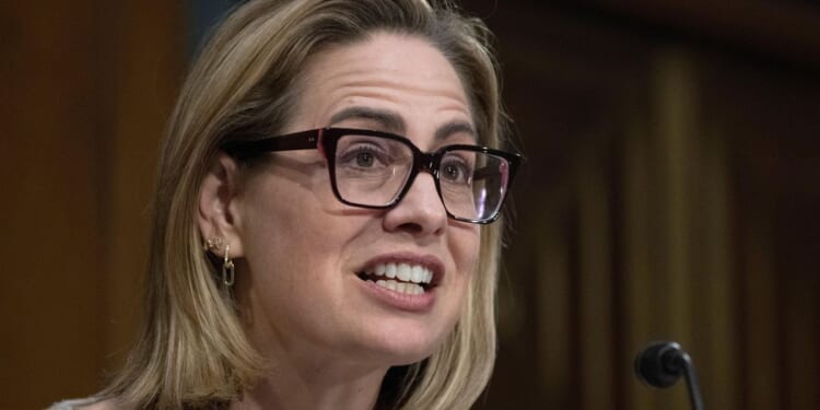 Sinema admits a romance with her security guard as she fights ex-wife’s lawsuit