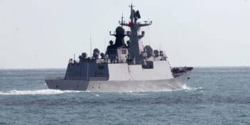 Chinese warships, jets conduct combat patrol near disputed South China Sea shoal