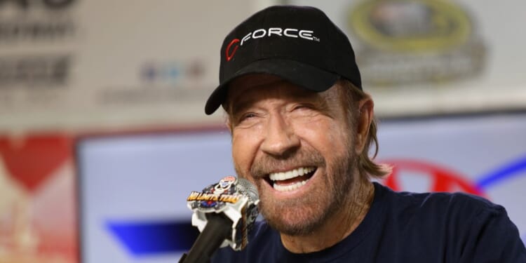 Actor Chuck Norris speaks with the media during a press conference prior to the NASCAR Sprint Cup Series AAA Texas 500 at Texas Motor Speedway on Nov. 6, 2016, in Fort Worth, Texas.