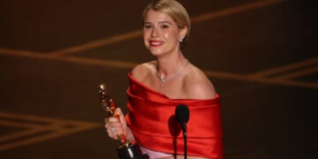 Irish actress Jessie Buckley accepts the award for Best Actress in a Leading Role for "Hamnet" onstage at the Dolby Theatre in Hollywood on Sunday.