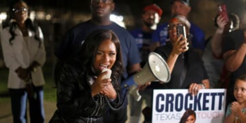 Rep. Jasmine Crockett speaks with supporters outside a polling station on Feb. 27, 2026, in Dallas, Texas.
