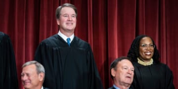 Members of the Supreme Court sit for a group photo following the recent addition of Associate Justice Ketanji Brown Jackson, at the Supreme Court building on Oct. 7, 2022, in Washington, D.C.