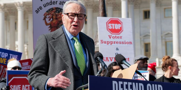 Senate Minority Leader Chuck Schumer attends a rally to speak out against the SAVE America Act outside the U.S. Capitol on March 18, 2026, in Washington, D.C.
