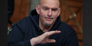 Sen. John Fetterman, a Pennsylvania Democrat, prepares to vote to advance Sen. Markwayne Mullin, an Oklahoma Republican, to be Secretary of the Department of Homeland Security. Democrats were so angry at Fetterman's vote with the Republicans that some called for him to be replaced.