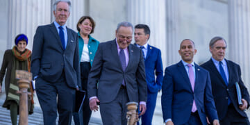 U.S. Senate Minority Leader Chuck Schumer (D-NY) and House Minority Leader Hakeem Jeffries (D-NY) walk out of the Capitol building to speak to the media on April 1, 2025