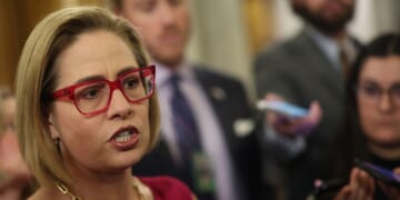 Now-former Sen. Kyrsten Sinema speaks to reporters at the U.S. Capitol on Feb. 5, 2024, in Washington, D.C.