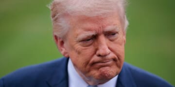 President Donald Trump stops to speak with reporters outside the White House on March 20, 2026, in Washington, DC.