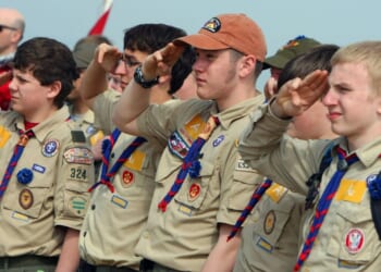 U.S. Boy Scouts are seen saluting while listening to their country's anthem in a file photo dated April 16, 2011.