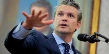 Secretary of War Pete Hegseth answers questions in the Oval Office at the White House on March 24, 2026, in Washington, D.C.