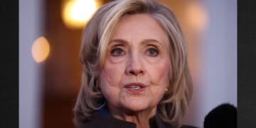Former Secretary of State Hillary Clinton speaks to the news media Thursday in Chappaqua, New York, after her deposition with the House Oversight Committee as they investigate links to convicted sex offender Jeffrey Epstein.