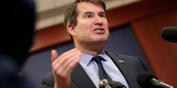 U.S. Rep. Seth Moulton (D-MA) speaks to reporters after a closed door meeting on Capitol Hill in Washington, DC on Dec. 16, 2025.