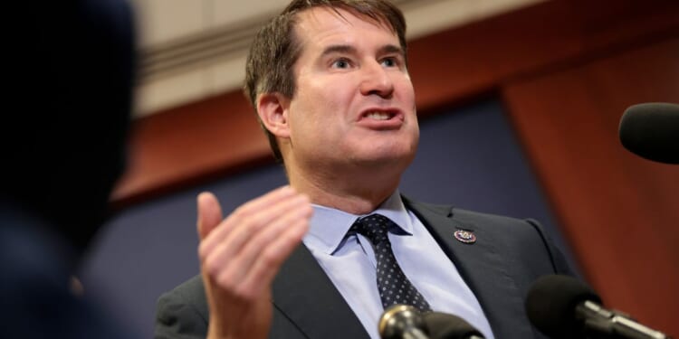 U.S. Rep. Seth Moulton (D-MA) speaks to reporters after a closed door meeting on Capitol Hill in Washington, DC on Dec. 16, 2025.
