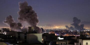 Smoke plumes rise over Tehran following missile strikes from both the United States and Israel's militaries on March 1, 2026.