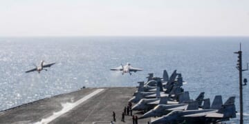 In this handout photo provided by the U.S. Navy, Two F/A-18 Super Hornets launch from the flight deck of Nimitz-class aircraft carrier USS Abraham Lincoln (CVN 72) in support of Operation Epic Fury on March 3, 2026, in the Mediterranean Sea.