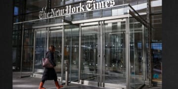 A person enters The New York Times building in New York City in a file photo dated Jan. 22 .