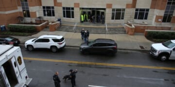 Police in Norfolk, Virginia, arrive outside Old Dominion University's campus Thursday after reports of an active shooter.