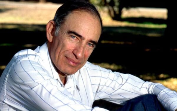 Paul Ehrlich pictured sitting down in field on April 5, 1993.