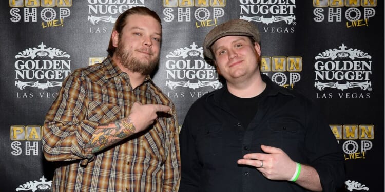 Corey "Big Hoss" Harrison and cast member Gus Langley arrive at the opening of "Pawn Shop Live!," a parody of History's "Pawn Stars" television series, at the Golden Nugget Hotel & Casino on Jan. 30, 2014, in Las Vegas, Nevada.