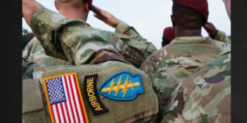 Army paratroopers from the 82nd Airborne Division based at Fort Bragg, North Carolina, are seen saluting in a file photo from June 12, 2025, during a reenlistment ceremony in conjunction with the Army's 250th Anniversary Parade in Washington, D.C.