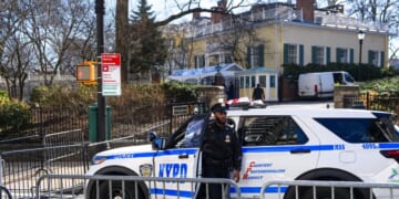 A New York Police Department officer stands guard outside of Gracie Mansion on March 9, 2026, in New York City.