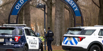 Police gather outside the Old Dominion University campus on March 12, 2026. (Kendall Warner - The Virginia Pilot / Getty Images)