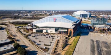 Globe Life Field is home to Major League Baseball's Texas Rangers, with AT&T Stadium in the background on Dec. 29, 2023, in Arlington, Texas.