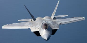 A U.S. F-22 Raptor is seen in a stock photo flying over the Pacific Ocean. Spain has closed its airspace to U.S. planes involved in the Iran war.