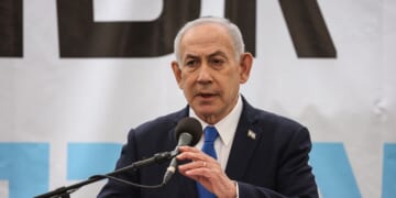 Israeli Prime Minister Benjamin Netanyahu delivers a speech during the funeral of Israeli hostage Ran Gvili, whose remains were finally brought back to Israel on Jan. 26, in the southern town of Meitar on Jan. 28, 2026.
