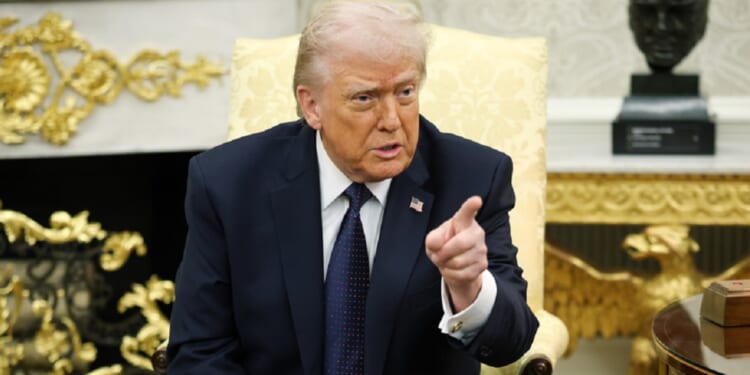President Donald Trump points while addressing a question in a news conference Tuesday in the Oval Office.