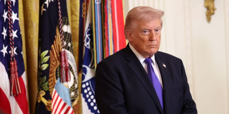 President Donald Trump arrives for a Medal of Honor Ceremony in the East Room of the White House on March 2, 2026, in Washington, D.C.