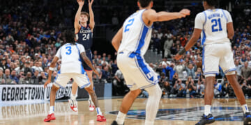 A guard playing for the University of Connecticut scores the winning basket in a game against Duke in the Elite Eight of the NCAA college basketball tournament on March 29, 2026.