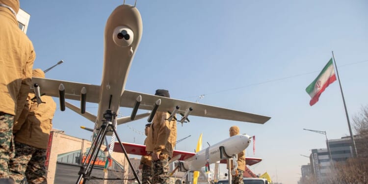 Iranian Basij militia members display their drones during military maneuvers in Tehran, Iran on Jan. 10, 2025.