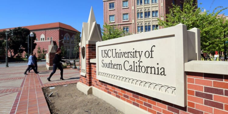 A sign welcomes people to the University of Southern California campus in Los Angeles in a file photo dated March 12, 2019.