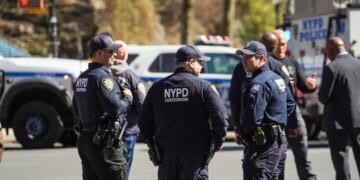New York Police Department counterterrorism officers respond to a suspicious package report in Carl Schurz Park, which borders Gracie Mansion, on March 10, 2026, in New York City.