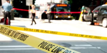 Investigators said the woman was found at the bus stop with 30 stab wounds.