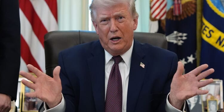 Trump signs order directing government to crack down on mail-in voting