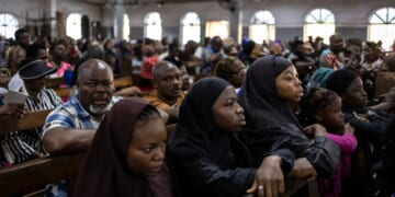 Christians attend church on Good Friday in Lagos on April 3, 2026.