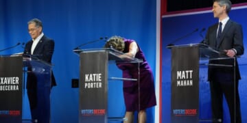 Katie Porter, center, reacts during a California gubernatorial debate Tuesday hosted by CBS LA at Pomona College in Claremont, California.