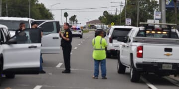 Law enforcement officers block traffic outside MacDill Air Force Base, the home of CENTCOM headquarters, in Tampa, Florida, on March 16, 2026.