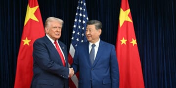 President Donald Trump and Chinese President Xi Jinping shake hands as they arrive for talks at the Gimhae Air Base, located next to the Gimhae International Airport in Busan on Oct. 30, 2025.