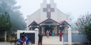 Christian churchgoers leave a church in Loimwe, Shan State, Myanmar on April 2, 2017.
