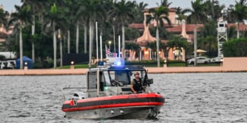 Members of the U.S. Coast Guard patrol the access point near President Donald Trump's Mar-a-Lago resort during the "No Kings" national day of protest, in Palm Beach, Florida, on May 28, 2026.