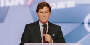 Conservative political commentator and podcast host Tucker Carlson speaks at Turning Point USA's annual AmericaFest conference, in remembrance of late right-wing political activist Charlie Kirk, in Phoenix, Arizona, on Dec. 18, 2025.