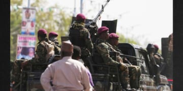 Soldiers patrol the streets in northern Nigeria in a file photo from Feb. 13. More thanr 25 people were killed over Easter weekend during several attacks in Nigeria.