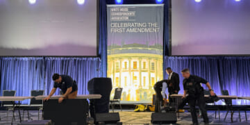 Staff clear out the White House Correspondents’ Dinner stage on April 25, 2026.