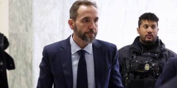 Ex-FBI Agents Sue After Firings Linked to Trump Investigation